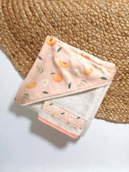 Cape de bain bébé en coton bio – Pêches & Pâquerettes